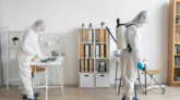people-wearing-protective-equipment-disinfecting-dangerous-area